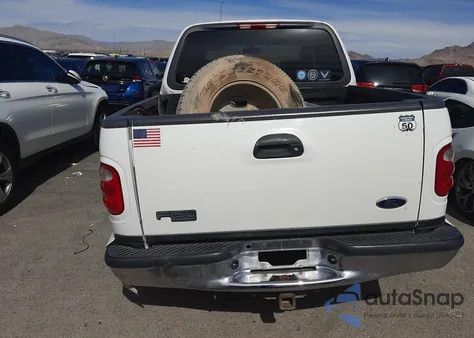 2002 Ford F150 Supercrew из США, поврежденный, VIN 1FTRW08L02KE04346